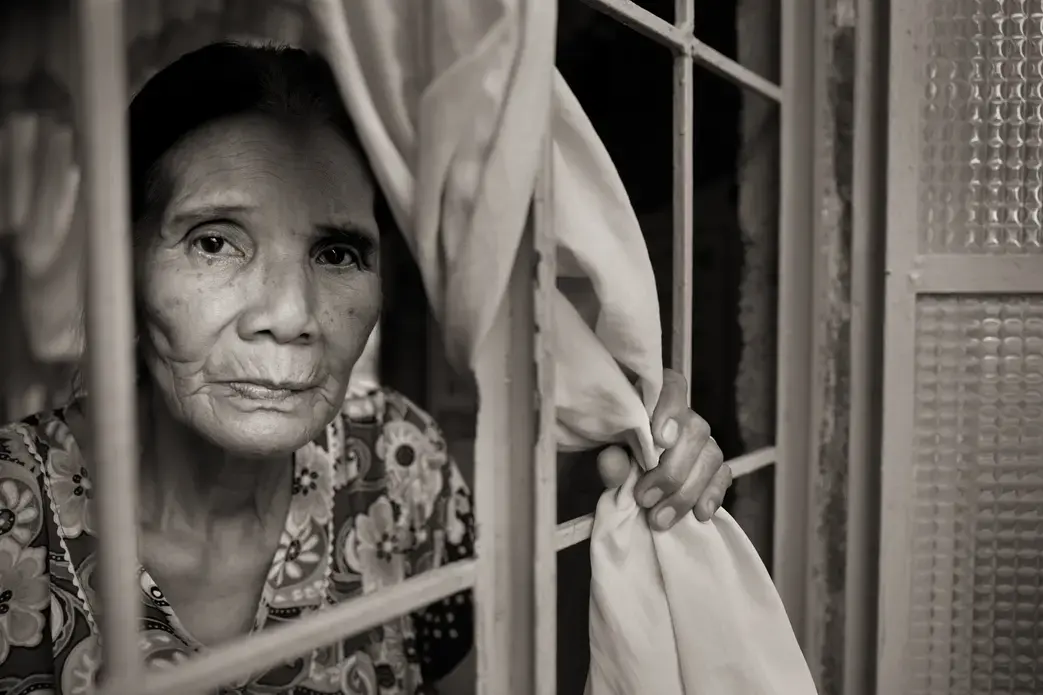 Perla Bulaon Balingit said she still has flashbacks of the atrocities she suffered at the hands of Japanese soldiers and wonders, 'How were they able to do that to another human as a human being?' Image by Cheryl Diaz Meyer. Philippines, 2019.