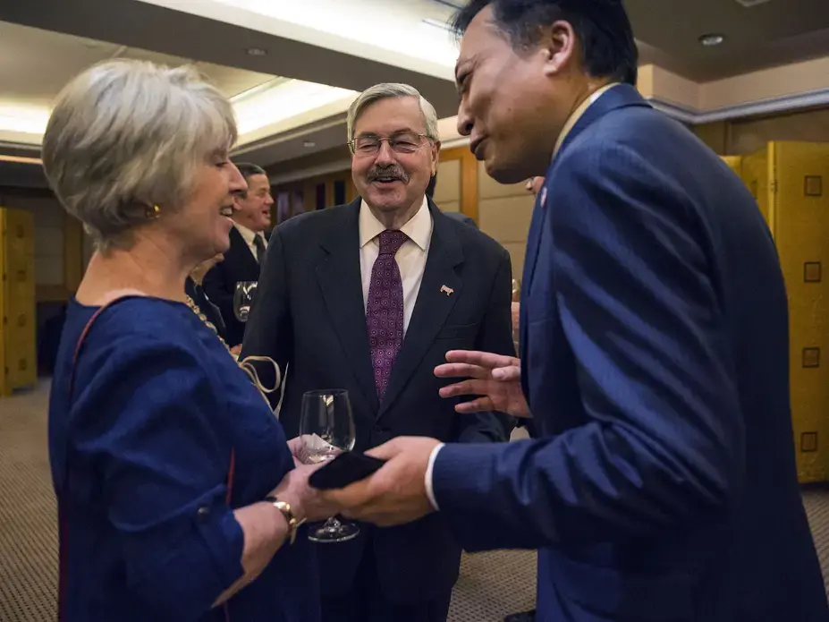 Terry Branstad, U.S. ambassador to China, with his wife Chris, speak with guests during an Iowa Sister States reception on Wednesday, Sept. 20, 2017, in Beijing, China. Image by Kelsey Kremer. China, 2017.