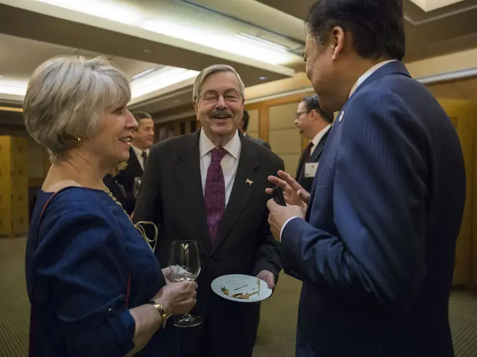 Terry Branstad, U.S. ambassador to China, and his wife, Chris, speak to guests during an Iowa Sister States reception on Wednesday, Sept. 20, 2017, in Beijing, China. The Iowa Sister States brought a delegation of Iowans to China to attend the groundbreaking of the China-U.S. Demonstration Farm, which is based on a farm in Iowa. Image by Kelsey Kremer. China, 2017.