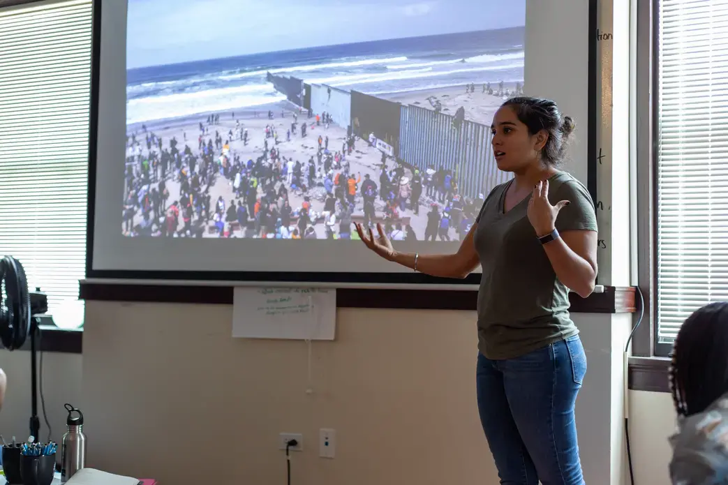 Meghan Dhaliwal presents her reporting work from the US-Mexico border to the student filmmakers. Dhaliwal discussed building a relationship with the subject of a film in order to help them feel comfortable on camera. Image by Claire Seaton. United States, 2019.