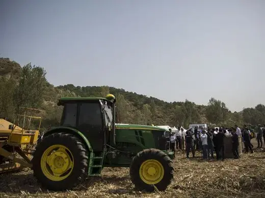  A demonstration of a Vermeer corn stalk baler is given during the groundbreaking of the China-US Demonstration Farm on Saturday, Sept. 23, 2017, in Luanping County, Hebei, China. Image by Kelsey Kremer. China, 2017.