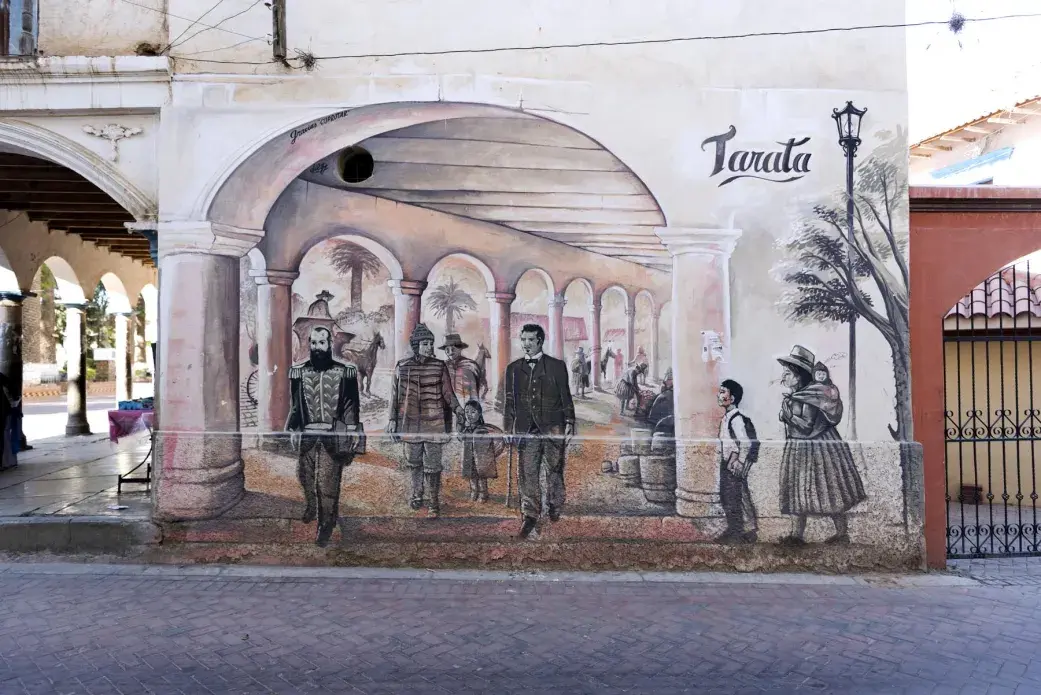 A mural on the side of a building that faces Tarata’s main plaza. The mural was commissioned by the Comité Pro-Tarata in Virginia. Image by Carey Averbook. Bolivia, 2016. 