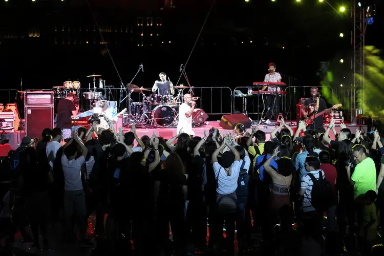 A Portuguese band plays their setlist during the Lusofonia Festival, an annual event that celebrates the culture and traditions of Portugal. Image courtesy of the Instituto Cultural de Macau. Macau, 2017.