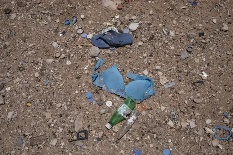 A bra on the ground where African migrants are held in desert compounds, known in Arabic as 'hosh.' Image by Nariman El-Mofty. Yemen, 2019.