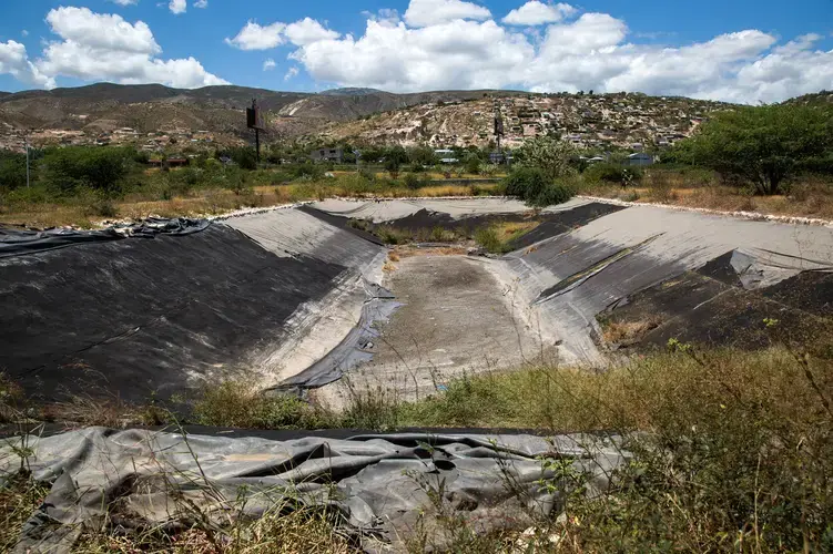 Since 2013, the $2.1 million sewage treatment plant at Titanyen has been closed. The lining of one of the disinfecting basins developed massive bubbles due to an engineering defect. Image by Marie Arago/NPR. Haiti, 2017.