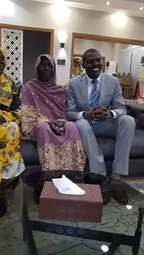 Abdulbari with his mother, Kalthoum Ismail, at Khartoum’s airport, after he arrived from the United States to take up his new position. Image courtesy of Nasredeen Abdulbari. Sudan, 2019.
