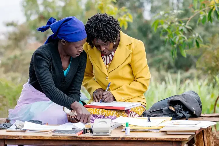 Patricia Kihumbu in a meeting. Image by George Achia. Kenya, undated. 