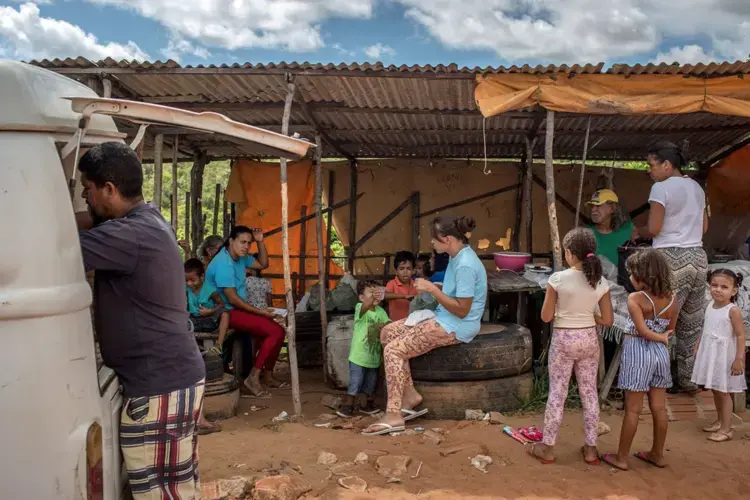 Vendors outside Alcaçuz sell food to visitors. Image by Lianne Milton. Brazil, 2018.