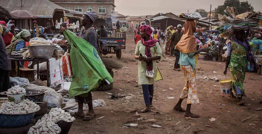 Women sell cowpea at this bustling grain and vegetable market in Tamale, Ghana's third-largest city. Ninety percent of Ghana's cowpea is grown in the northern part of the country. Image by Ankur Paliwal. Ghana, 2019.