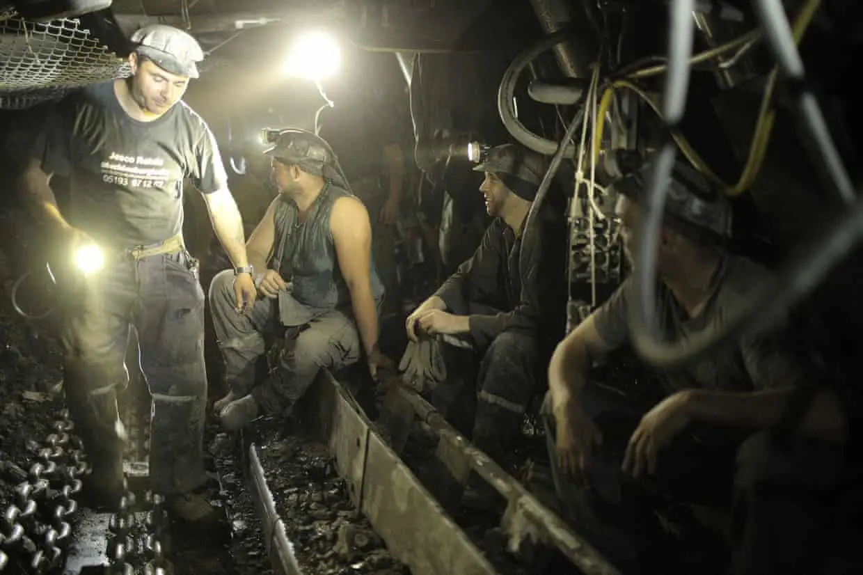 Miners work inside the Livezeni mine.