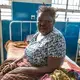 Ms Phirie suffers from severe lung problems - yet she never smoked. She comes in an out of hospital frequently, as the doctors can't seem to identify the cause of her illness. Image by Nathalie Bertrams. Malawi, 2017.