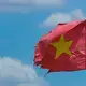 The Vietnamese flag flies at TH Milk's operations in Nghia Son, Vietnam. Image by Mark Hoffman. Vietnam, 2019.