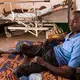 Oumar Abdouly, 24, recuperates in Chinko’s clinic after falling ill with parasites. Image by Jack Losh. Central African Republic, 2018.