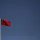 The Peoples Republic of China flag flies over Tiananmen Square on Friday, Sept. 22, 2017, in Beijing. Image by Kelsey Kremer. China, 2017.