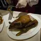 Beijing Duck, a famous preparation of duck, is served for dinner in Beijing, on Thursday, Sept. 21, 2017, in China's capital city. Image by Kelsey Kremer. China, 2017.