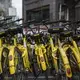 Rental bikes are parked in rows at a busy intersection on Wednesday, Sept. 27, 2017, in Beijing, China. Bikes like these are plentiful and available to rent all over the city. Image by Kelsey Kremer. China, 2017.