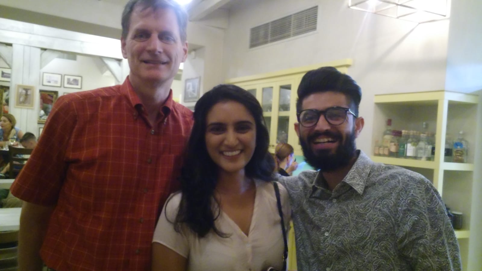 Divya Mishra pictured with Rizwan and her doctoral adviser, Dr. Peter Winch
