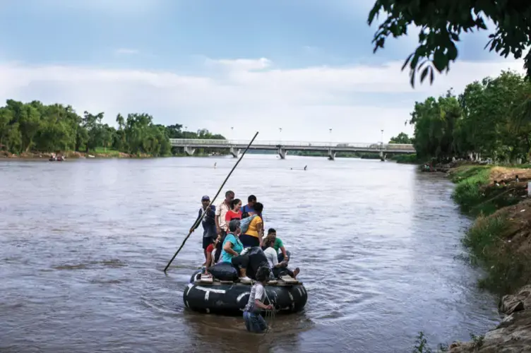 Getting North, Through Whatever Means Possible | People cross the Suchiate River from Guatemala into the Mexican city of Ciudad Hidalgo. Image by Jose Cabezas. Guatemala, 2018.</p>
<p>