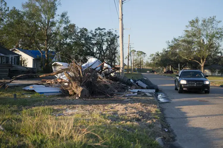 The destruction from back-to-back Hurricanes Laura and Delta remains vast in most neighborhoods of Lake Charles. The global pandemic has slowed recovery efforts. Image by Katie Sikora. United States, 2020.<br />
